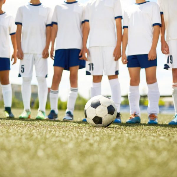 Young Football Team in Field Young Football Team in Field